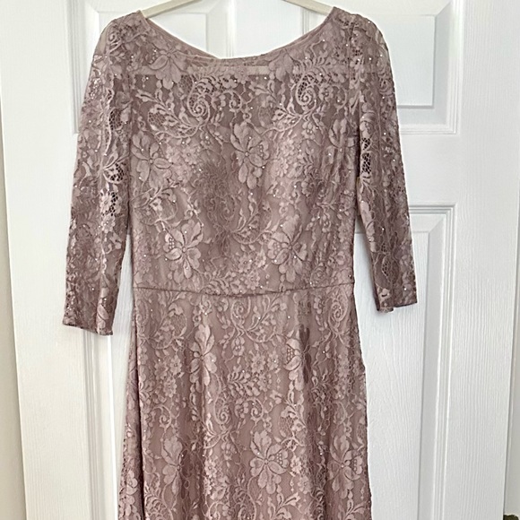 La Femme  Lace Quarter
Length Sleeve Bateau A-line
Dress size 6 Formal Gown - Picture 14 of 15